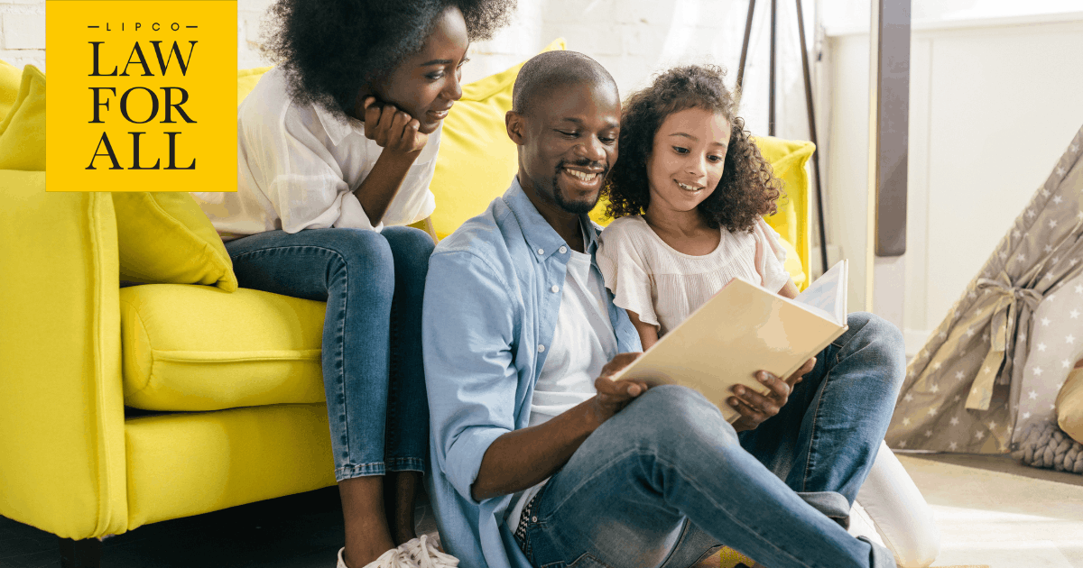 South African parents reading with their child, illustrating why intestate succession matters
