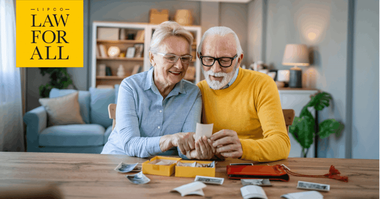 Elderly couple looking at photos and memories